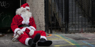 This Santa is drunk and probably out on parole.