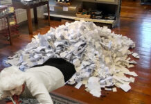 Authorities allowed Millie Franks to keep her receipt pile shown here in her home.