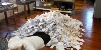 Authorities allowed Millie Franks to keep her receipt pile shown here in her home.