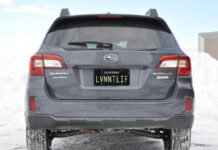 Charlie and Barbara Winkler, recent Nevada County transplants from San Ramon, hope that their new vanity license plate will make them feel like locals.